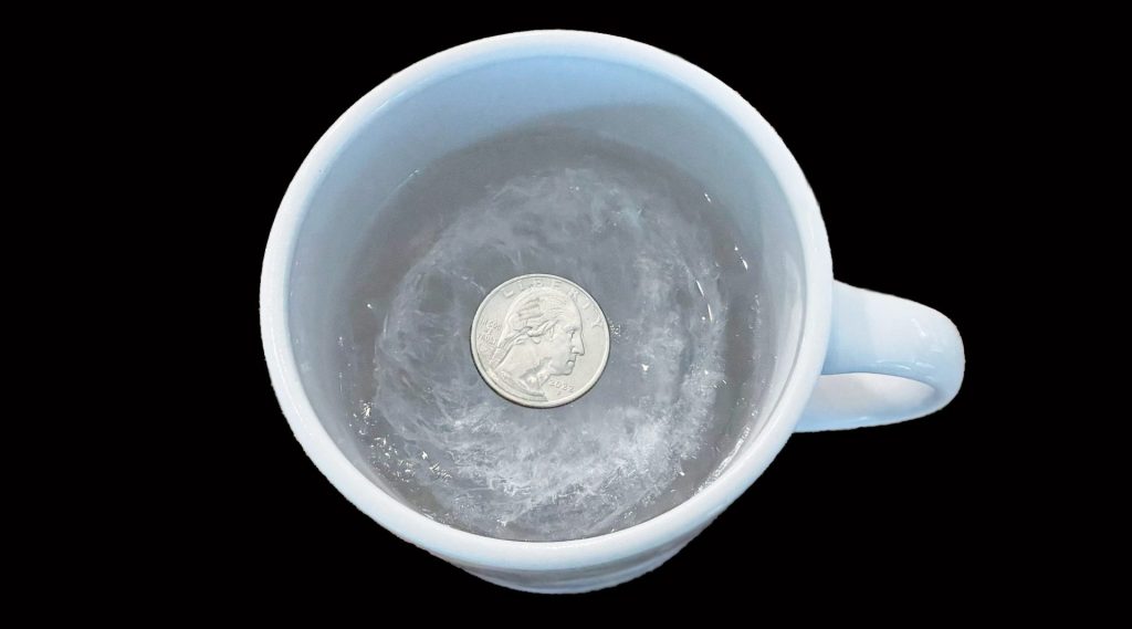 quarter-in-ice-water